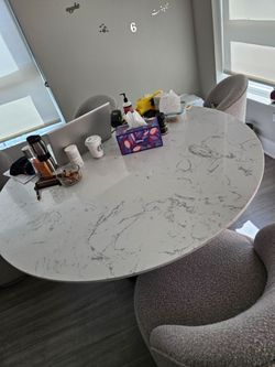 Oval Marble-Top Dining Table