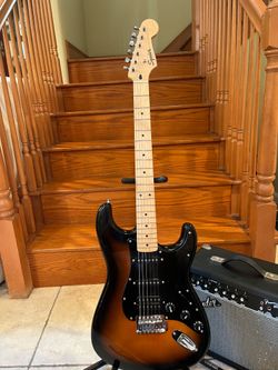 Squier Stratocaster (Mint) w/ Fender Amp