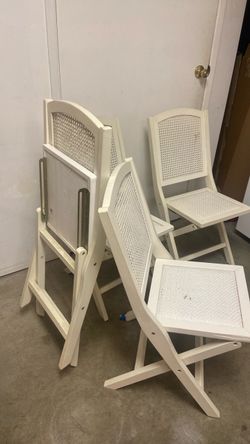4 wooden folding chairs