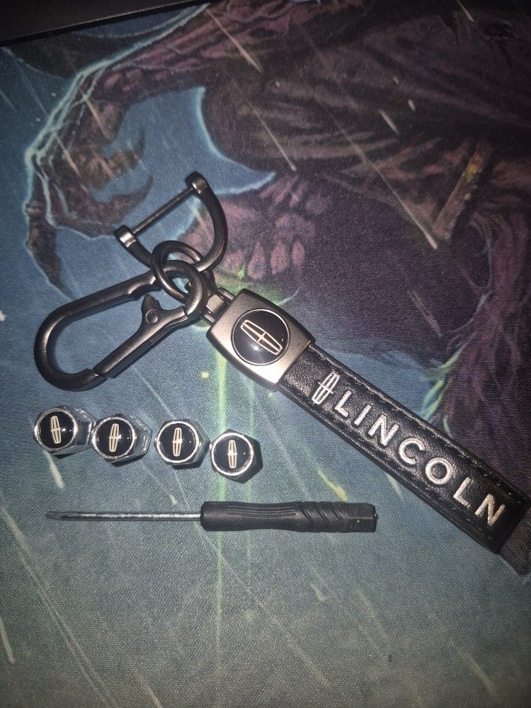Lincoln Keychain And Tire Gauge Caps