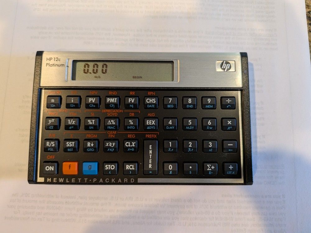 Hewlett-Packard 12c Platinum Financial Calculator With HP Leather Case And HP Manual