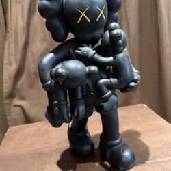 Kaws Black vinyl figure clean slate..18