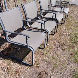 FOUR NICE MATCHING METAL PATIO CHAIRS 