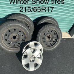Used - Like New Bridgestone Blizzak WS80 215/65 R17 Snow Tires (Used For 1 Season Only) With Rims and hub cap  5x115 bolt pattern