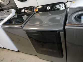 SAMSUNG BLACK JUMBO TOP LOAD WASHER AND GAS DRYER