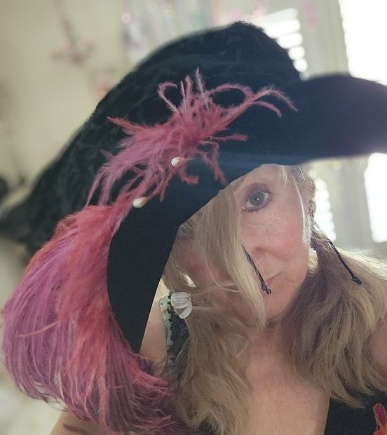 Renissance black velvet hat with pink feather