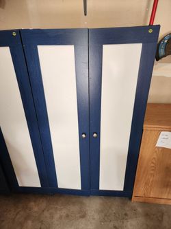 Blue wood storage cabinet