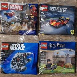 4 Brand New, factory-sealed LEGO polybags. Perfect for Christmas stockings