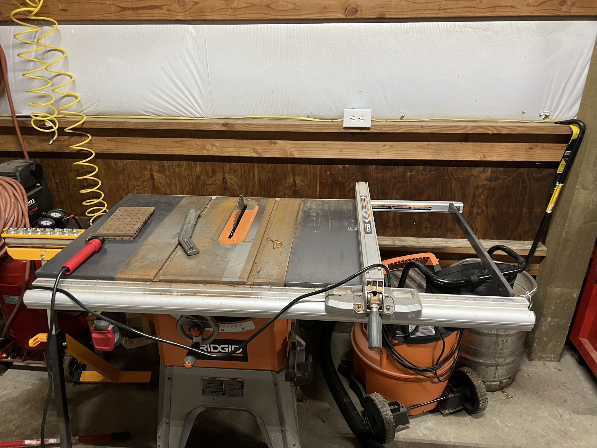 Rigid Table Saw With Roller Stand