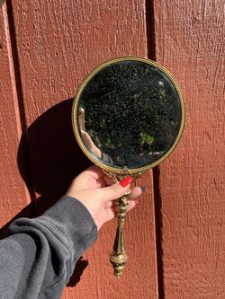 Antique handheld mirror