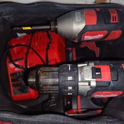 Milwaukee 2 Drills 2 Battery Charger And Bag