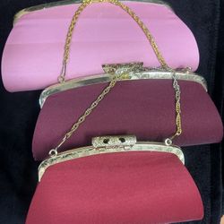 Vintage Red, Pink, Burgundy satin evening purse with a gold filigree clasp and a gold chain handle