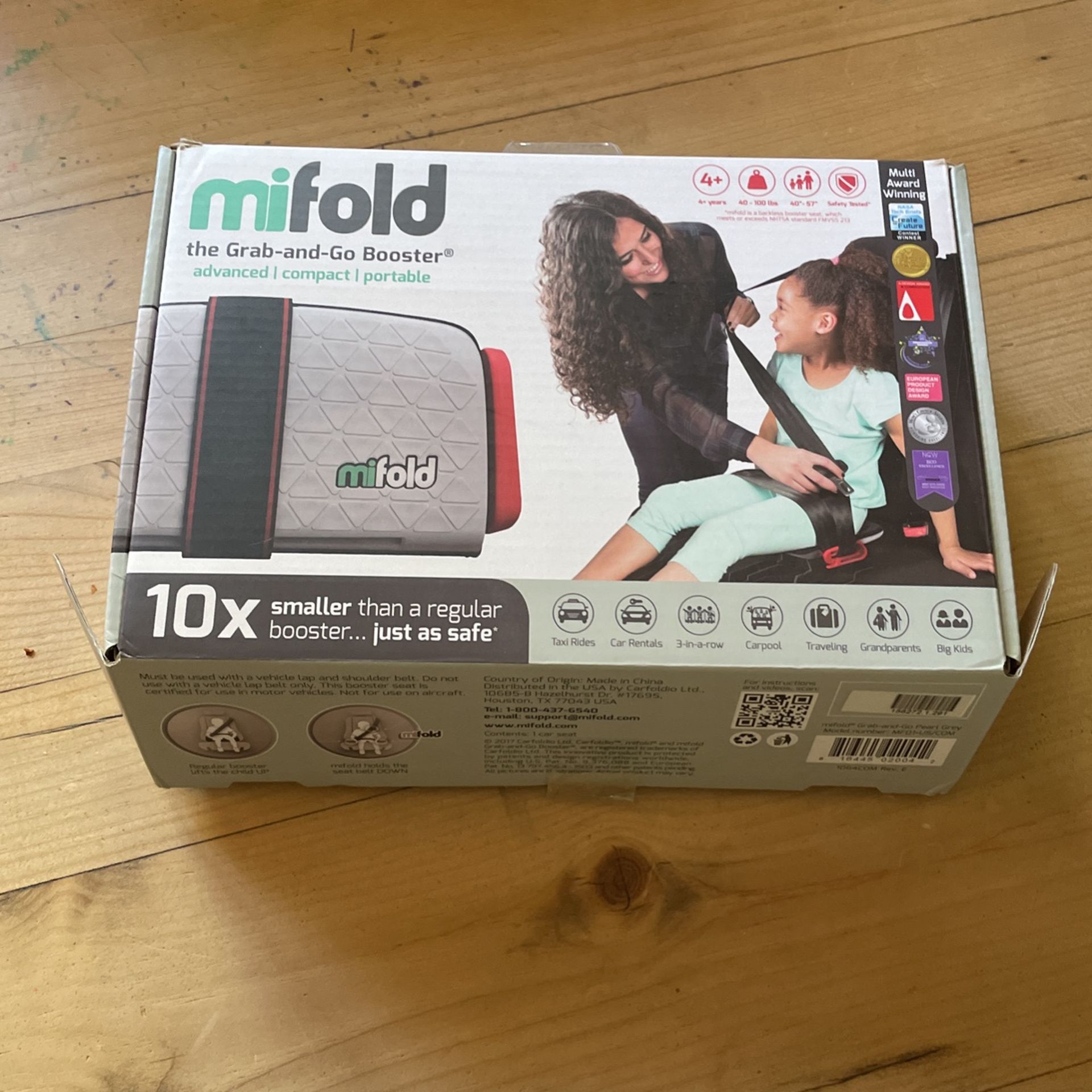 mifold grab and go travel booster