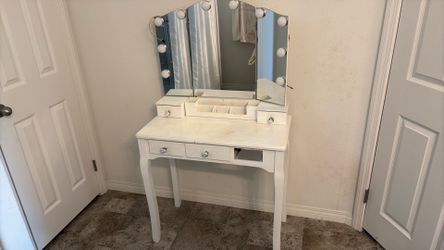 Vanity with mirror and lights