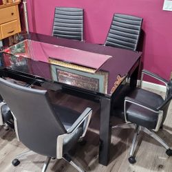 Dinner Table With A Set Of 6 Leather Adjustable Chairs $699