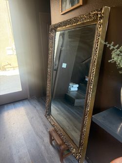 Gold ornate mirror