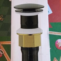 BATHROOM POP UP DRAIN
with detachable baske black new 