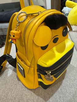 Winnie the Pooh Loungefly backpack with an extra matching Winnie the Pooh keychain included!