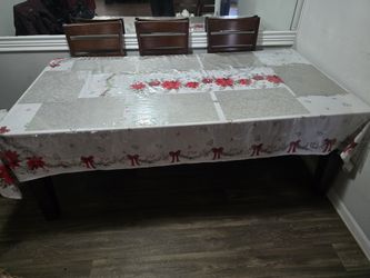 wood expandable table and 8 chairs