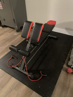 Elevate your space with this exceptional vintage wrought iron coffee table, a statement piece distinguished by its hand-forged scrollwork, grape-clust