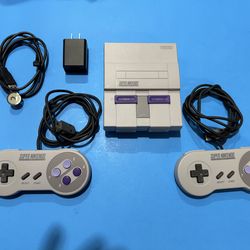 Official Super Nintendo Mini Classic with caring case