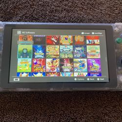 NINTENDO SWITCH LITE with 125 SWITCH GAMES INCLUDED