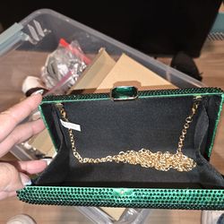 Green clutch bag
