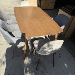 Dining table and five chairs