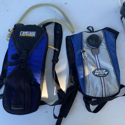 2 camel paks 1 with a unused bladder an hose other has unised bladder but needs a new hose. 