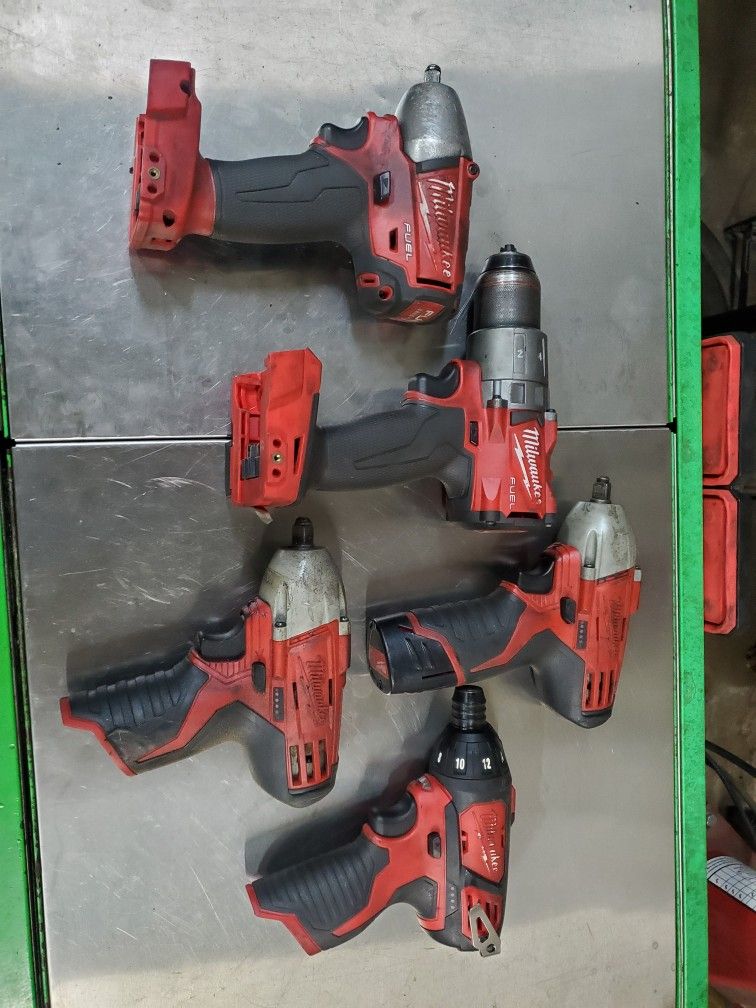 5 Milwaukee Drill And 3/8 Drive Impacts