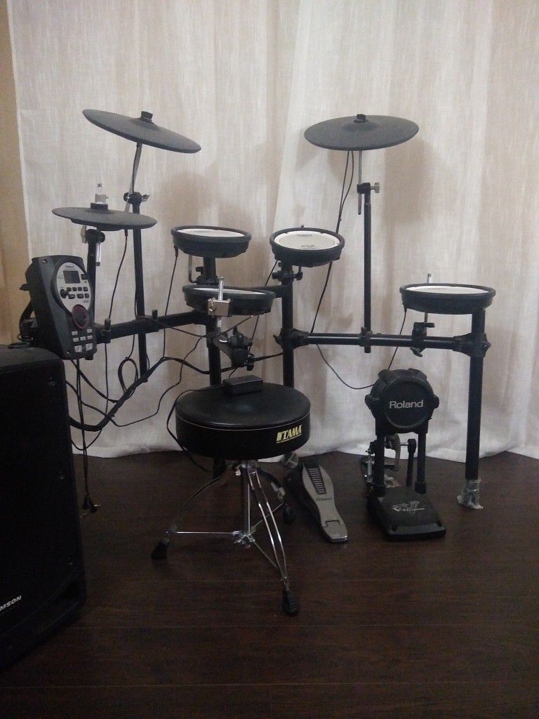 Roland Drum Set With Speaker And Chair  For $700