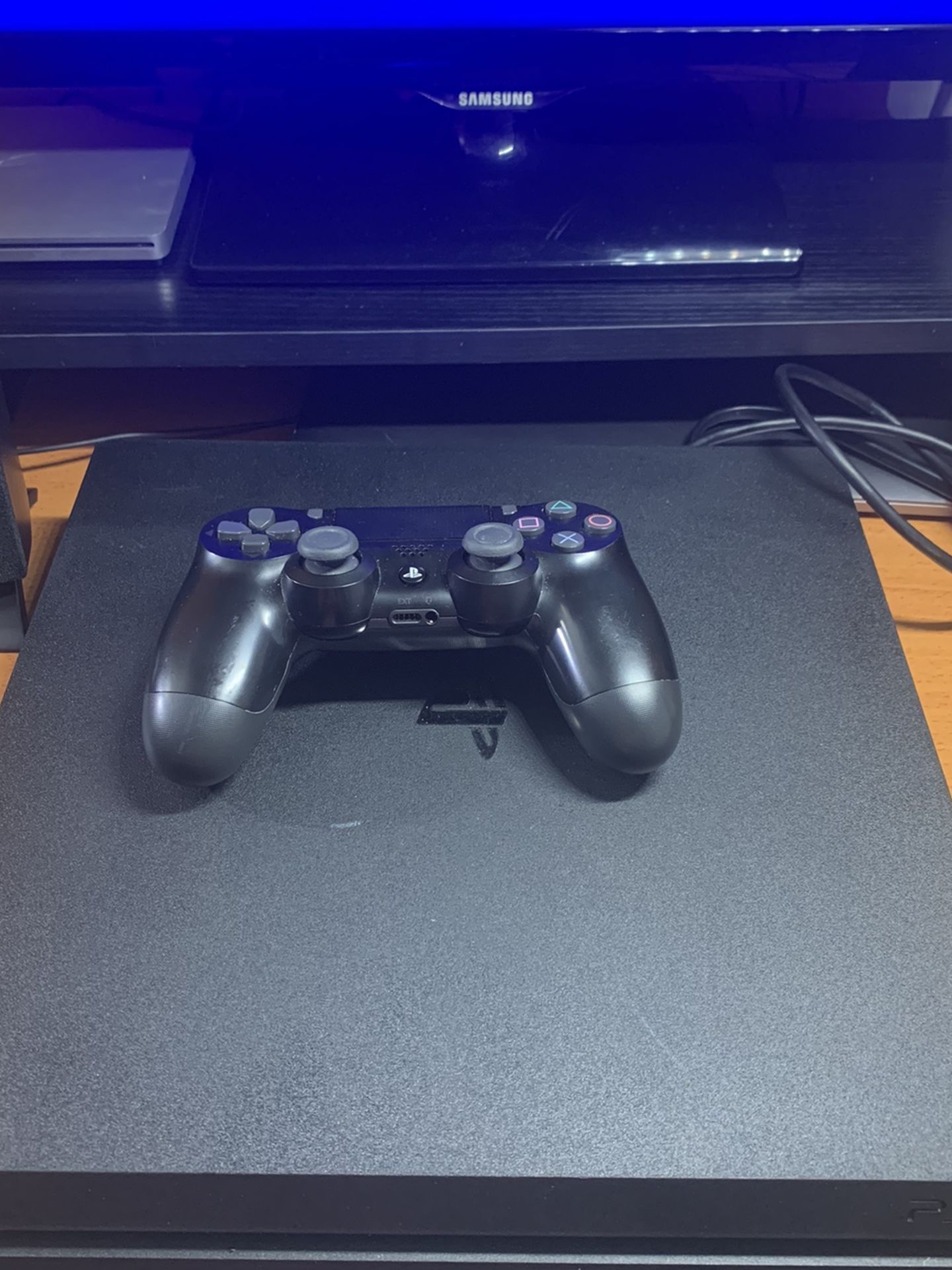 PS4 Pro 1TB *Like new with cables and a controller.