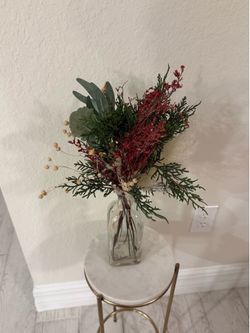 Stems in glass vase