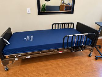Adjustable electric bed barely used (months)