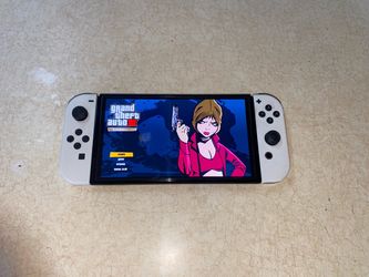 NINTENDO SWITCH OLED Loaded with 125 GAMES MARIO PARTY,MARIO KART,POKEMON,ZELDA,MINECRAFT and Many More
