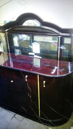 Cherry wood dining room cabinet and table