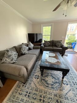 Living room sofa set and central table with carpet