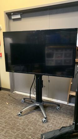 70” Tv With Rolling Stand 