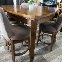 Table And Swivel Chairs