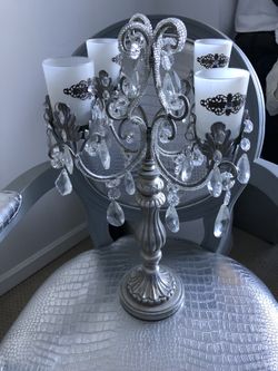 Candles hold silver new
