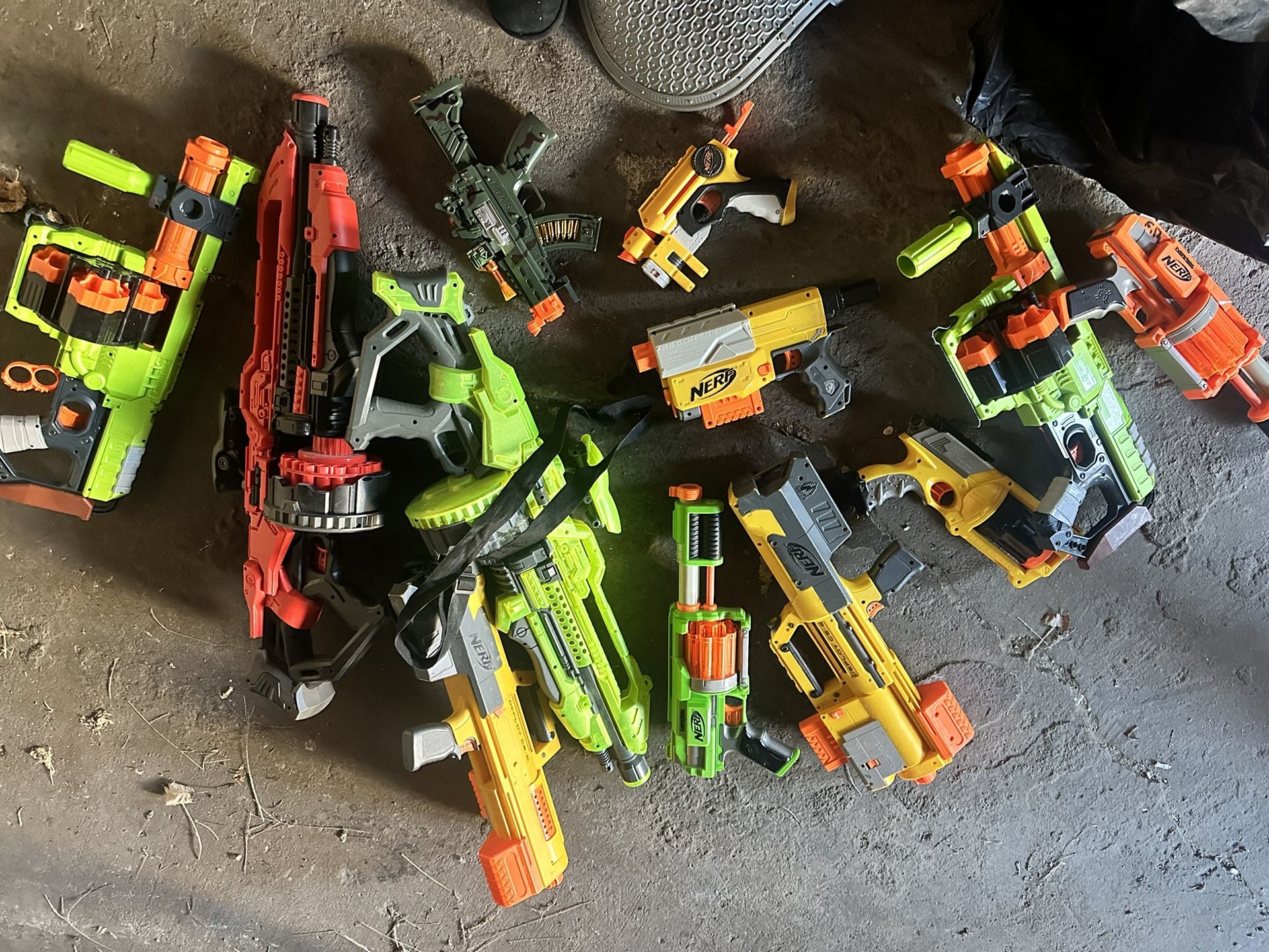 Assorted Nerf guns.