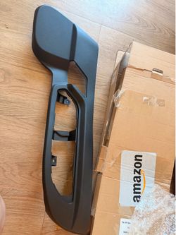 Driver side seat track cover or trim panel