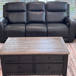 LEATHER (2) Brand new Ashley leather couches, (1) recliner, (1) coffee table