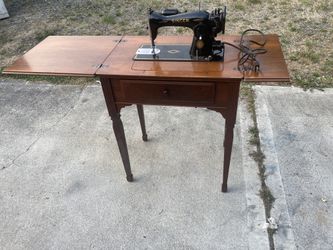 Singer Sewing Machine And Cabinet