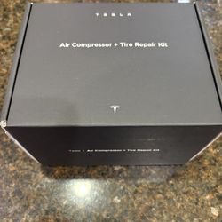 NEW Tesla Air Compressor And Tire Repair Kit