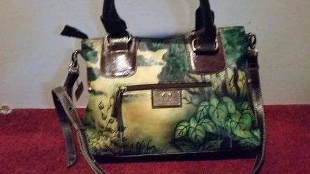Sharif brand lion & lioness bag