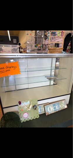 Clothing racks and glass counters