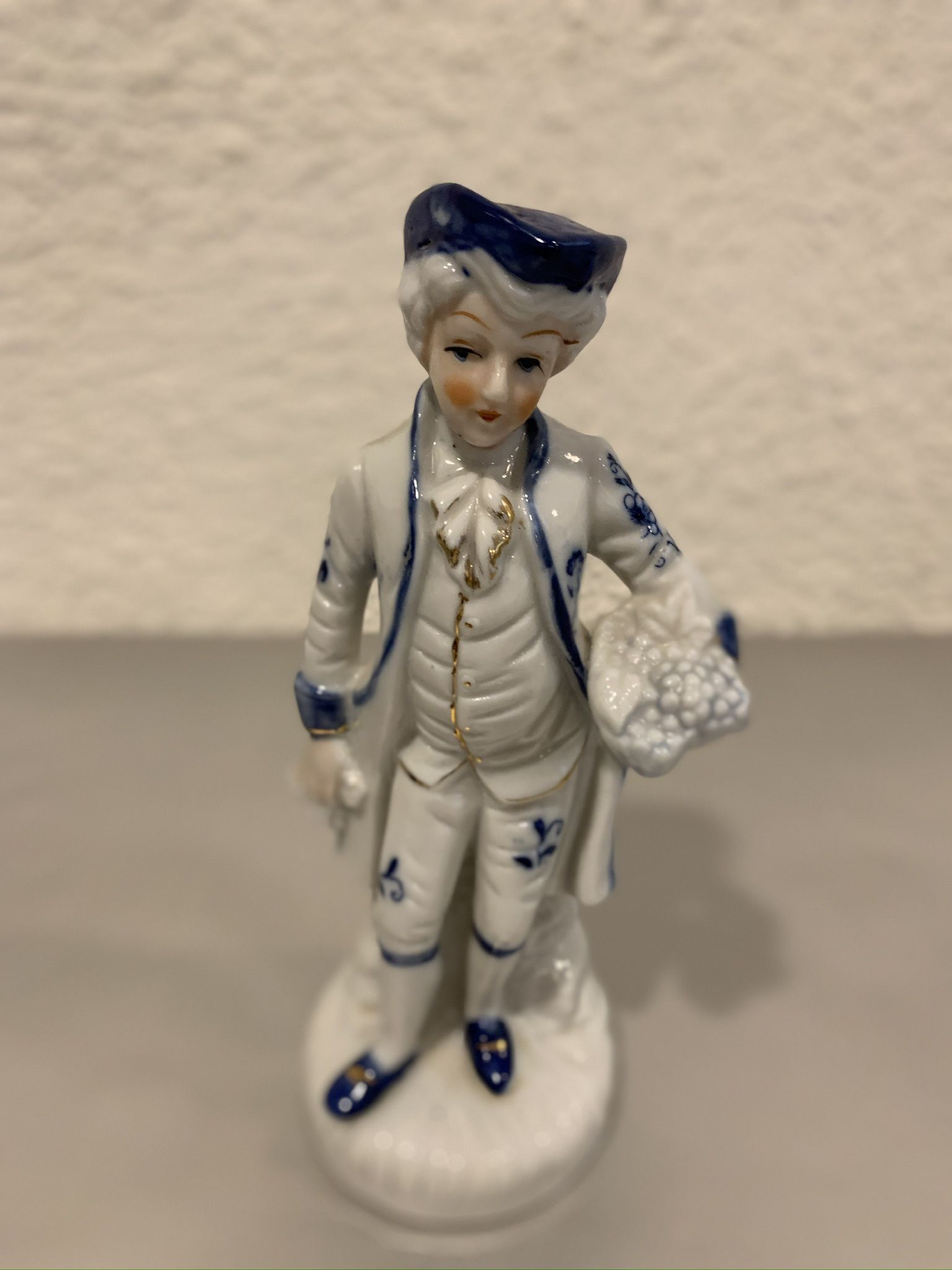 Vintage KPM porcelain cobalt blue and white colonial Man figurine 6.50” tall