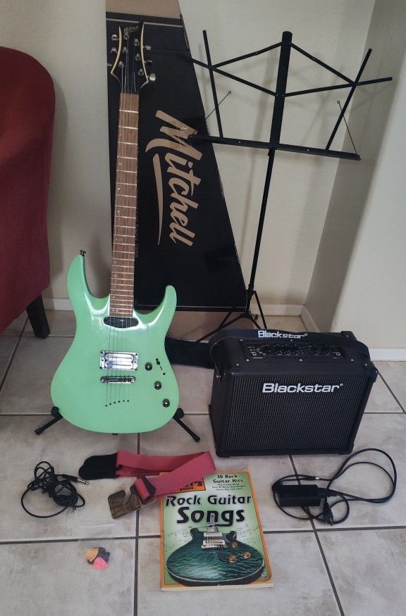 Mitchell MD200 Electric Guitar, Blackstar Amp, Stands, Strap and accessories 
