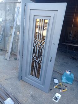 Gray Steel Security Door with Decorative Iron Grille